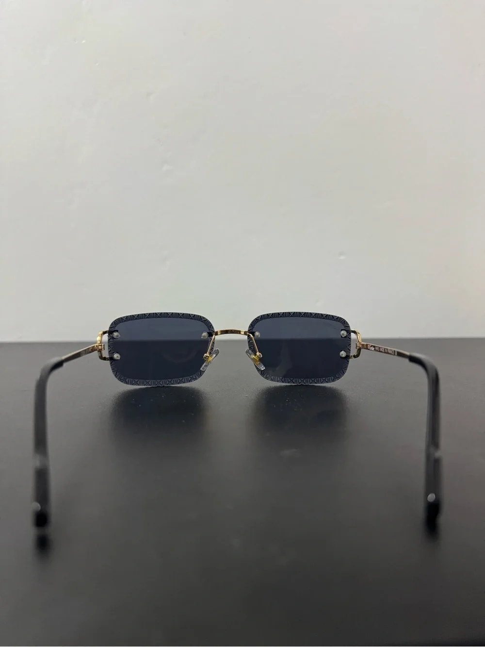 Cartier Designer Black Gold Rimless Rectangle Diamond Cut Engraved Sunglasses Co